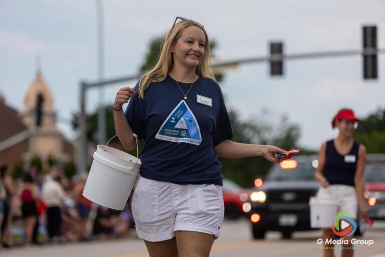 CAROL STREAM, Ill. — July 4, 2026: Participants march down the parade route during the annual Carol Stream Independence Day Parade in Carol Stream, Ill., Saturday, July 4, 2026. Despite a week-long regional heat wave, the community-funded tradition—a village staple since 1987—drew large crowds for the nearly two-hour event, which honored local military veterans as the collective Grand Marshal. (GMedia Group/Zachary Gebis)