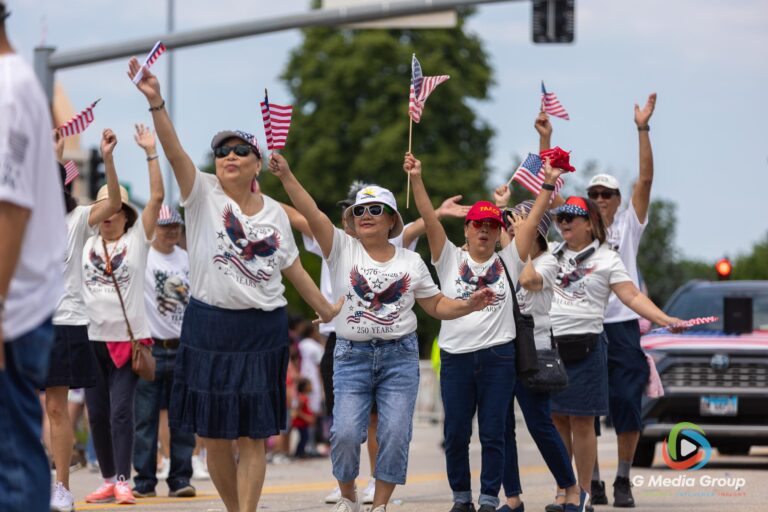 CAROL STREAM, Ill. — July 4, 2026: Participants march down the parade route during the annual Carol Stream Independence Day Parade in Carol Stream, Ill., Saturday, July 4, 2026. Despite a week-long regional heat wave, the community-funded tradition—a village staple since 1987—drew large crowds for the nearly two-hour event, which honored local military veterans as the collective Grand Marshal. (GMedia Group/Zachary Gebis)