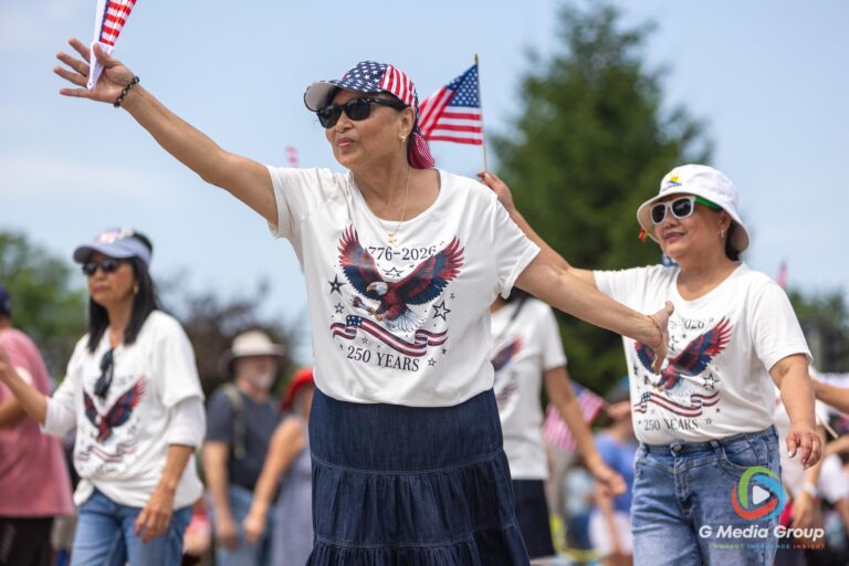 CAROL STREAM, Ill. — July 4, 2026: Participants march down the parade route during the annual Carol Stream Independence Day Parade in Carol Stream, Ill., Saturday, July 4, 2026. Despite a week-long regional heat wave, the community-funded tradition—a village staple since 1987—drew large crowds for the nearly two-hour event, which honored local military veterans as the collective Grand Marshal. (GMedia Group/Zachary Gebis)
