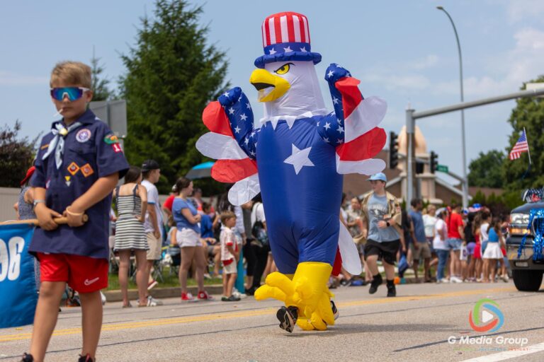 CAROL STREAM, Ill. — July 4, 2026: Participants march down the parade route during the annual Carol Stream Independence Day Parade in Carol Stream, Ill., Saturday, July 4, 2026. Despite a week-long regional heat wave, the community-funded tradition—a village staple since 1987—drew large crowds for the nearly two-hour event, which honored local military veterans as the collective Grand Marshal. (GMedia Group/Zachary Gebis)
