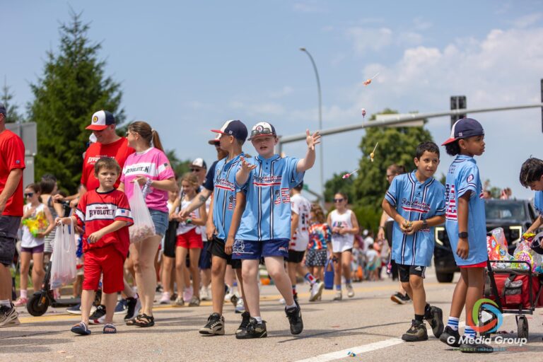 CAROL STREAM, Ill. — July 4, 2026: Participants march down the parade route during the annual Carol Stream Independence Day Parade in Carol Stream, Ill., Saturday, July 4, 2026. Despite a week-long regional heat wave, the community-funded tradition—a village staple since 1987—drew large crowds for the nearly two-hour event, which honored local military veterans as the collective Grand Marshal. (GMedia Group/Zachary Gebis)
