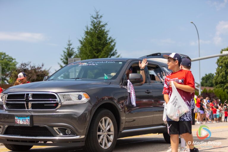CAROL STREAM, Ill. — July 4, 2026: Participants march down the parade route during the annual Carol Stream Independence Day Parade in Carol Stream, Ill., Saturday, July 4, 2026. Despite a week-long regional heat wave, the community-funded tradition—a village staple since 1987—drew large crowds for the nearly two-hour event, which honored local military veterans as the collective Grand Marshal. (GMedia Group/Zachary Gebis)