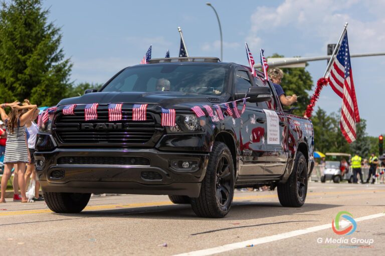 CAROL STREAM, Ill. — July 4, 2026: Participants march down the parade route during the annual Carol Stream Independence Day Parade in Carol Stream, Ill., Saturday, July 4, 2026. Despite a week-long regional heat wave, the community-funded tradition—a village staple since 1987—drew large crowds for the nearly two-hour event, which honored local military veterans as the collective Grand Marshal. (GMedia Group/Zachary Gebis)