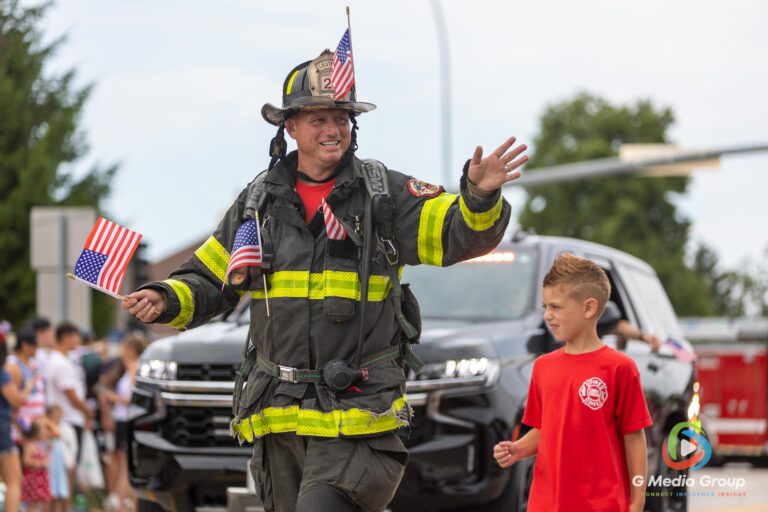 CAROL STREAM, Ill. — July 4, 2026: Participants march down the parade route during the annual Carol Stream Independence Day Parade in Carol Stream, Ill., Saturday, July 4, 2026. Despite a week-long regional heat wave, the community-funded tradition—a village staple since 1987—drew large crowds for the nearly two-hour event, which honored local military veterans as the collective Grand Marshal. (GMedia Group/Zachary Gebis)