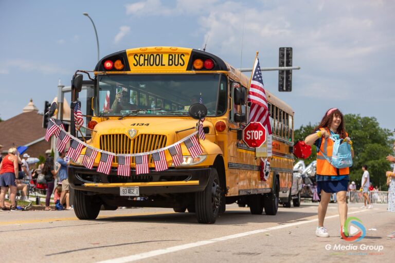 CAROL STREAM, Ill. — July 4, 2026: Participants march down the parade route during the annual Carol Stream Independence Day Parade in Carol Stream, Ill., Saturday, July 4, 2026. Despite a week-long regional heat wave, the community-funded tradition—a village staple since 1987—drew large crowds for the nearly two-hour event, which honored local military veterans as the collective Grand Marshal. (GMedia Group/Zachary Gebis)