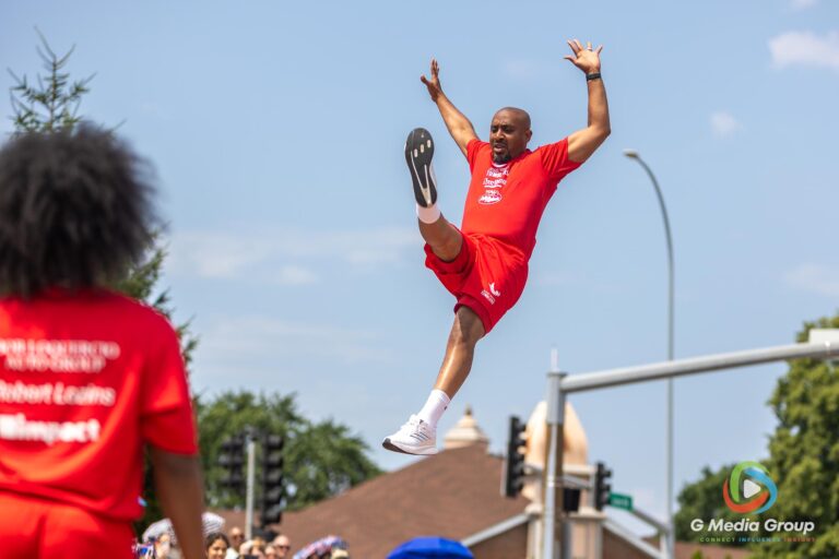 CAROL STREAM, Ill. — July 4, 2026: Participants march down the parade route during the annual Carol Stream Independence Day Parade in Carol Stream, Ill., Saturday, July 4, 2026. Despite a week-long regional heat wave, the community-funded tradition—a village staple since 1987—drew large crowds for the nearly two-hour event, which honored local military veterans as the collective Grand Marshal. (GMedia Group/Zachary Gebis)