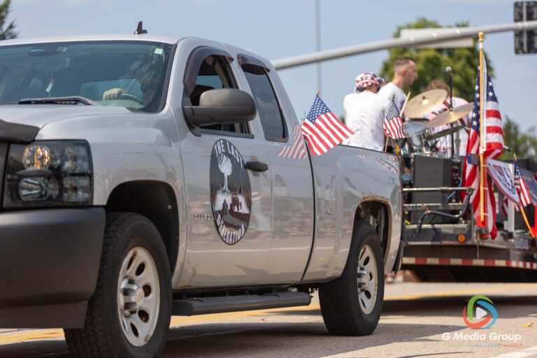 CAROL STREAM, Ill. — July 4, 2026: Participants march down the parade route during the annual Carol Stream Independence Day Parade in Carol Stream, Ill., Saturday, July 4, 2026. Despite a week-long regional heat wave, the community-funded tradition—a village staple since 1987—drew large crowds for the nearly two-hour event, which honored local military veterans as the collective Grand Marshal. (GMedia Group/Zachary Gebis)
