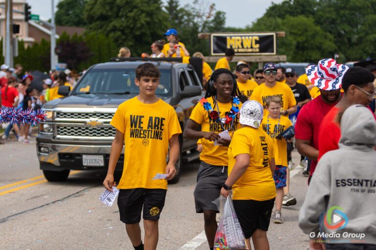 CAROL STREAM, Ill. — July 4, 2026: Participants march down the parade route during the annual Carol Stream Independence Day Parade in Carol Stream, Ill., Saturday, July 4, 2026. Despite a week-long regional heat wave, the community-funded tradition—a village staple since 1987—drew large crowds for the nearly two-hour event, which honored local military veterans as the collective Grand Marshal. (GMedia Group/Zachary Gebis)
