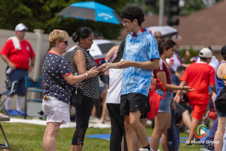 CAROL STREAM, Ill. — July 4, 2026: Participants march down the parade route during the annual Carol Stream Independence Day Parade in Carol Stream, Ill., Saturday, July 4, 2026. Despite a week-long regional heat wave, the community-funded tradition—a village staple since 1987—drew large crowds for the nearly two-hour event, which honored local military veterans as the collective Grand Marshal. (GMedia Group/Zachary Gebis)