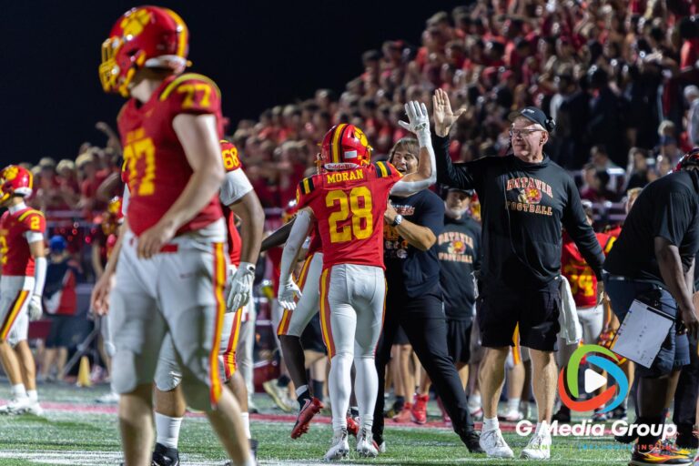 Batavia's LIAM MORAN (#28) celebrates after scoring a late second-quarter touchdown against Maine South in Batavia, Illinois, on August 21, 2026. Moran's touchdown helped push Batavia ahead 28-21.