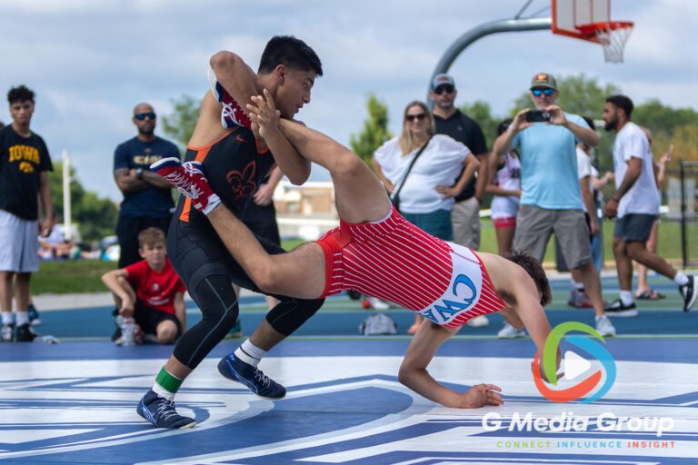 Wrestlers compete during the Summer Fiesta Wrestling Tournament at Carol Stream Community Park in Carol Stream, Ill., Saturday, Aug. 8, 2026. The outdoor event brought together youth, high school, and open-division competitors from across the region. (Photo by GMedia Group)