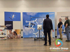 Community members view a static display of the Amazon MK30 delivery drone during an Amazon Prime Air public open house at the ARC in West Chicago on Sept. 24, 2026. (Photo: G Media Group)