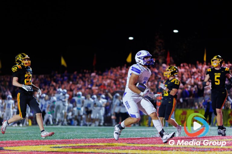 Geneva High School running back Nelson Wedel (2) breaks across the goal line for a first-quarter touchdown against Batavia at Batavia High School in Batavia, Ill., on September 25, 2026. The scoring run helped Geneva establish an early lead in an eventual 56–49 victory.