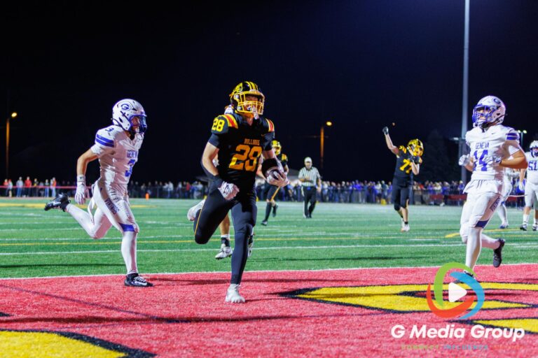 Batavia running back Liam Moran (28) scores a second-quarter touchdown against Geneva at Batavia High School in Batavia, Ill., on September 25, 2026. The scoring play brought Batavia within seven points during a high-scoring rivalry matchup.