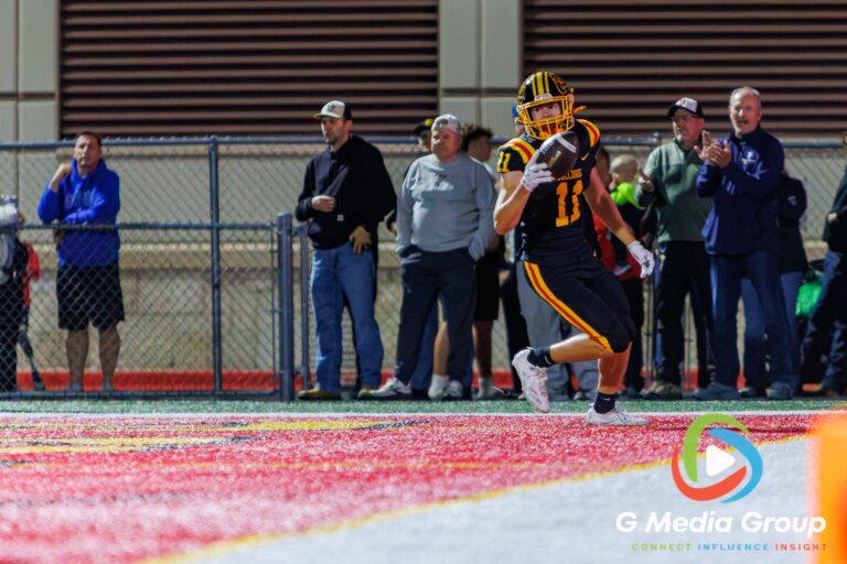 Batavia receiver Luke Johansen (11) secures a pass in the end zone during the second quarter against Geneva at Batavia High School in Batavia, Ill., on September 25, 2026. The touchdown pulled Batavia to within 28–21 before halftime.