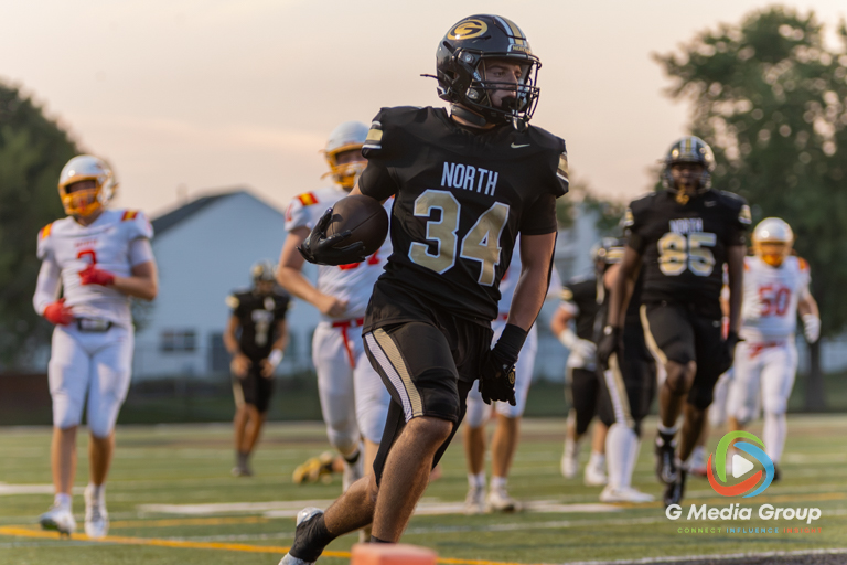 Glenbard North senior running back Angelo Gatses (#34) runs into the end zone for a first-quarter touchdown during a high school football game at Glenbard North High School in Carol Stream, IL, on September 04, 2026.