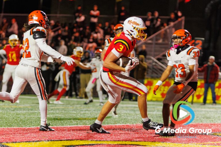 Batavia receiver Thomas Prescott (#3) hauls in a pass near the goal line against Wheaton Warrenville South during a varsity football game at Bulldog Stadium in Batavia, Illinois, on October 16, 2026.