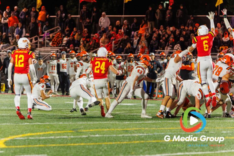 Batavia defenders attempt to block a fourth-quarter field goal attempt by Wheaton Warrenville South during a varsity football matchup at Bulldog Stadium in Batavia, Illinois, on October 16, 2026.