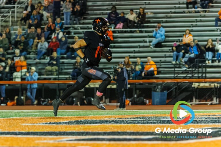 St. Charles East player Brady Habas (#14) rushes into the end zone for a second-quarter touchdown against Batavia on October 9, 2026.